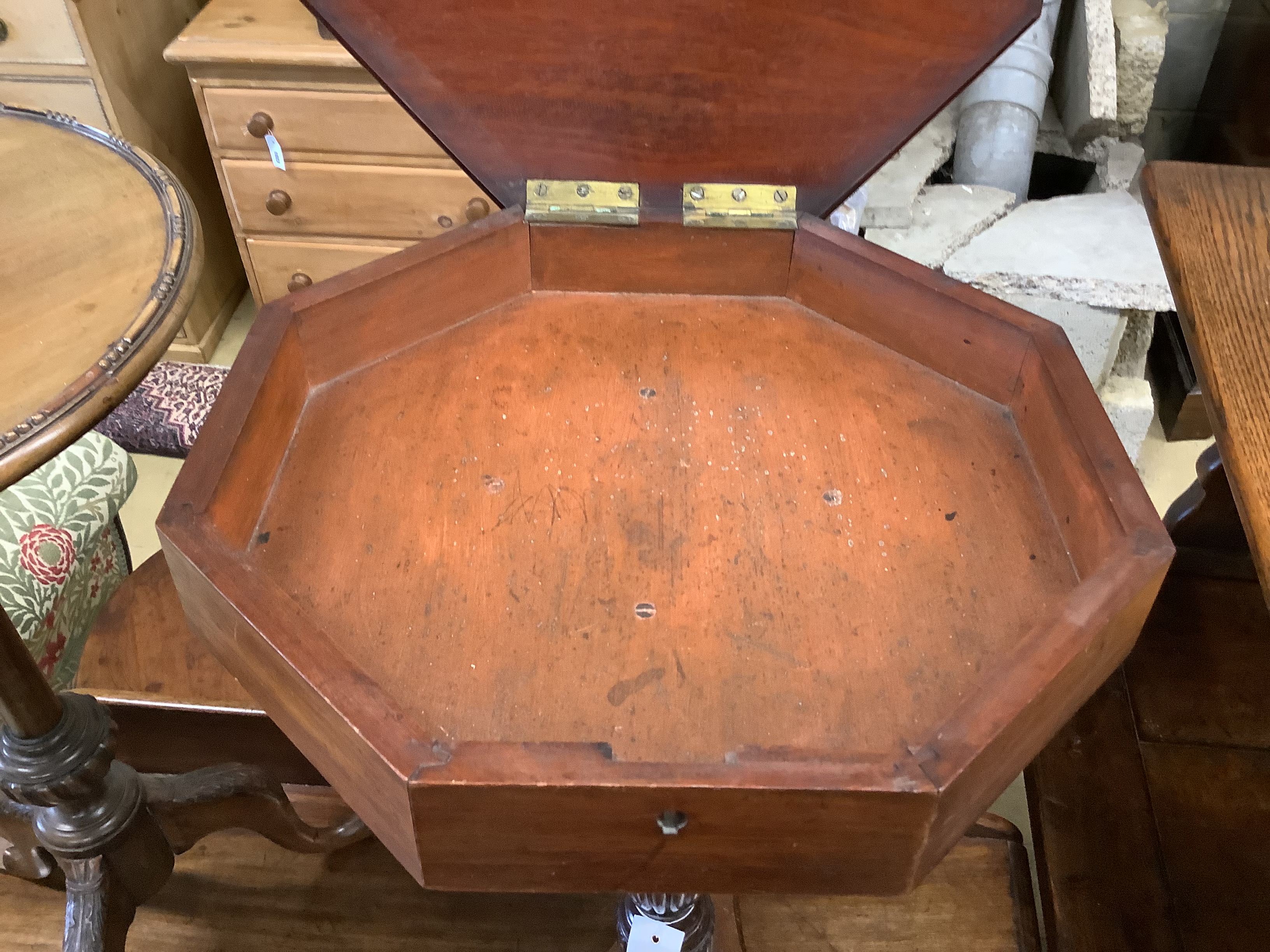 An octagonal mahogany wine / side table, width 40cm, height 74cm together with a mahogany wine table with shaped border